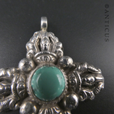 Silver and Turquoise Tribal-Style Pendant.