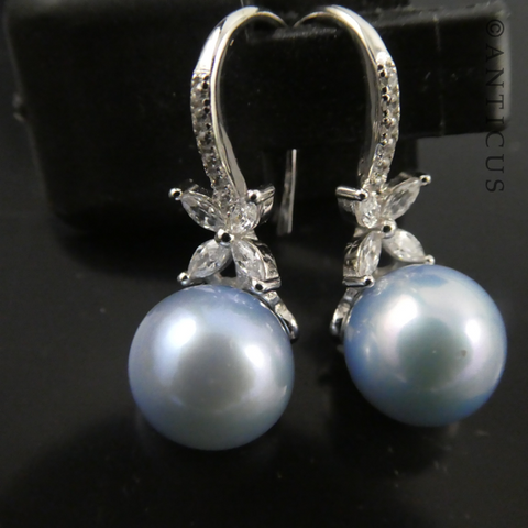 Pair of Blue Pearl and Silver Drop Earrings.