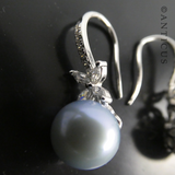 Pair of Blue Pearl and Silver Drop Earrings.