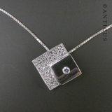 Diamond-Shaped Silver and Crystals Pendant on Chain.