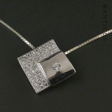 Diamond-Shaped Silver and Crystals Pendant on Chain.