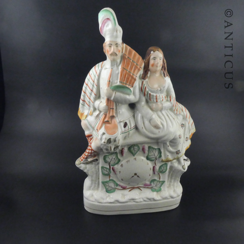 Staffordshire Flat Back Figurine of Highland Couple.