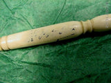 Carved Bone Fist Handle, containing Stanhope.