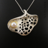 Pearl and Silver Pendant on Chain.