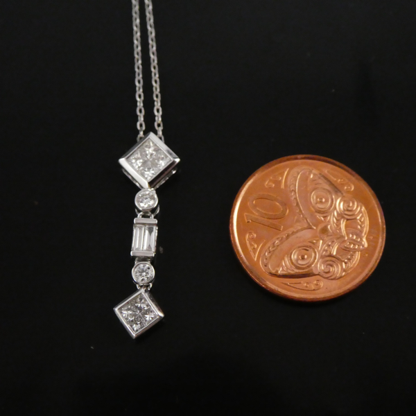 18ct White Gold and Diamond Pendant.