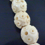 Long Strand, Carved Bone Beads, Early 20th Century.