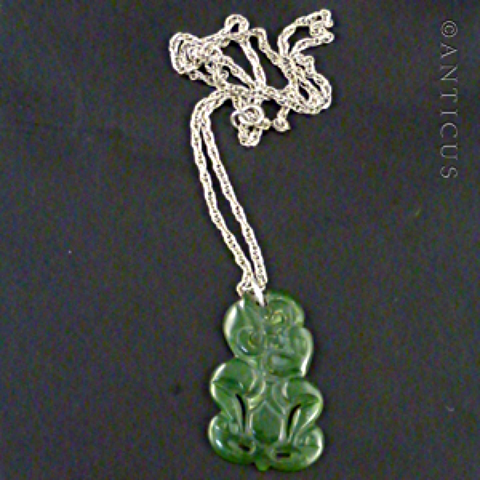 Jade tiki pendant deals