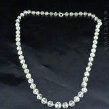 Graduated Strand Crystal Beads on Chain.