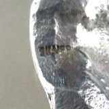Cast Silver Brooch, Girl in Pipi Shell.