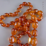 Long Strand of Faceted Baltic Amber Beads.