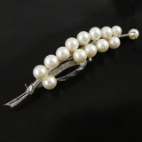 Silver and Cultured Pearl Floral Spray Brooch.