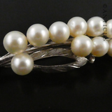 Silver and Cultured Pearl Floral Spray Brooch.