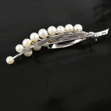 Silver and Cultured Pearl Floral Spray Brooch.