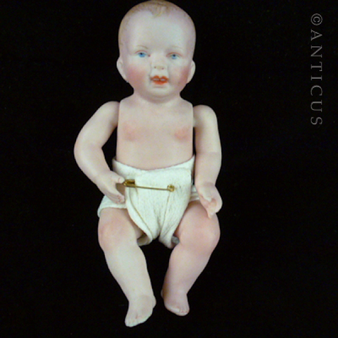 Child's Bisque Small Doll, Jointed Limbs.