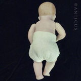 Child's Bisque Small Doll, Jointed Limbs.