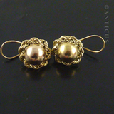 Pair of 14k Gold Round Dome Earrings.