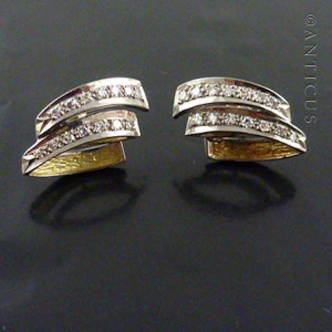 Pair of White Gold and Diamond Earrings.