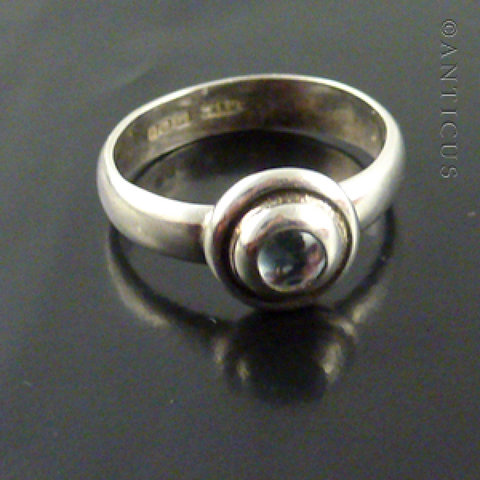 Sterling Silver and Round Stone Ring.