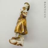 Tiny German Porcelain Gilded Figurine.