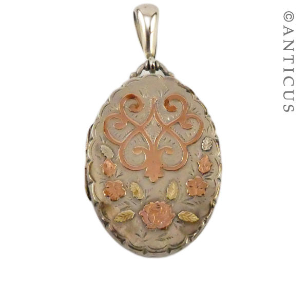 Sterling Silver Locket with Gold Decoration.