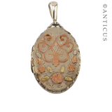 Sterling Silver Locket with Gold Decoration.