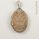 Sterling Silver Locket with Gold Decoration.