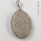 Sterling Silver Locket with Gold Decoration.