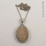 Sterling Silver Locket with Gold Decoration.