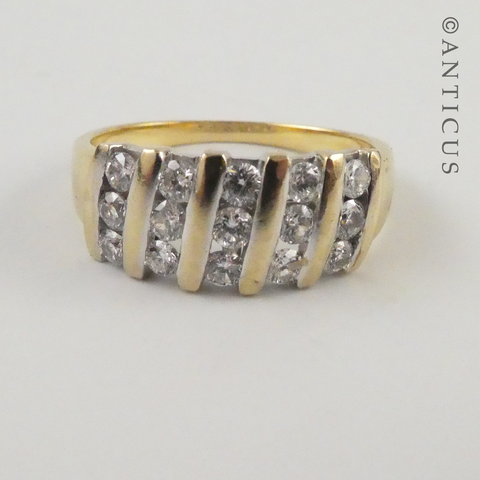 18ct Gold and Channel-Set Diamond Ring.
