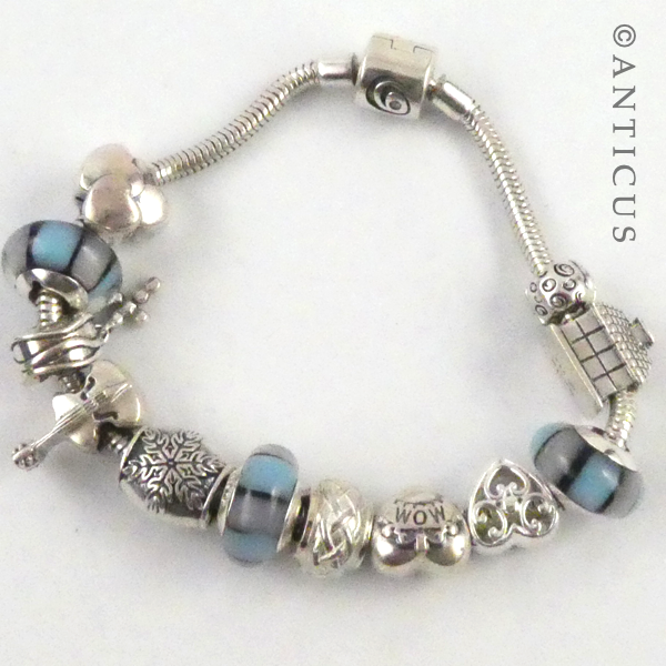 Modern Charm Bracelet, Silver with 12 Charm Beads.