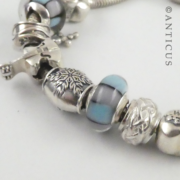 Modern Charm Bracelet, Silver with 12 Charm Beads.