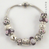 Modern Charm Bracelet, Silver with 12 Charm Beads.