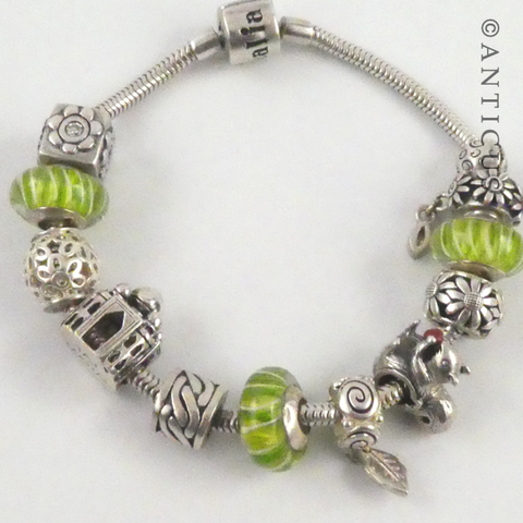 Modern Charm Bracelet, Silver with 12 Charm Beads.