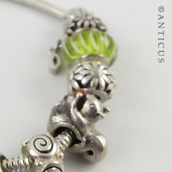 Modern Charm Bracelet, Silver with 12 Charm Beads.