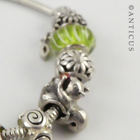 Modern Charm Bracelet, Silver with 12 Charm Beads.