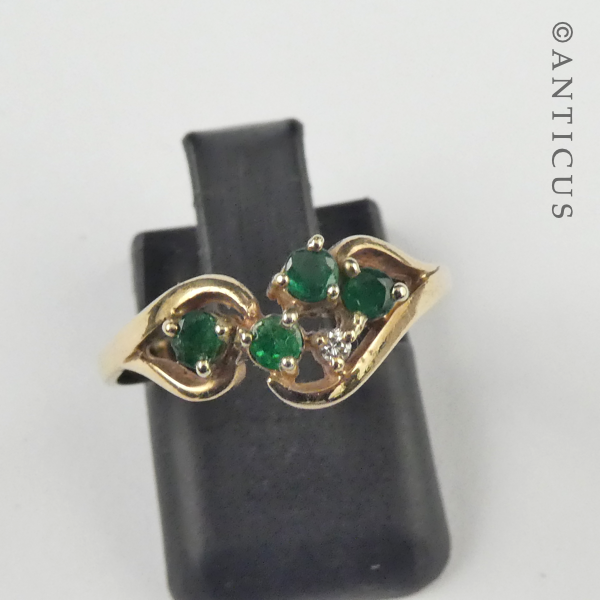 Gold, Emerald and Diamond Ring.